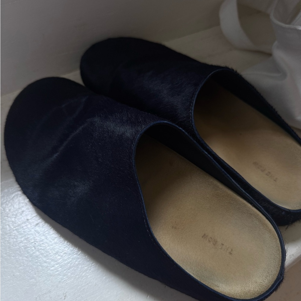 The Row Hugo navy pony slides